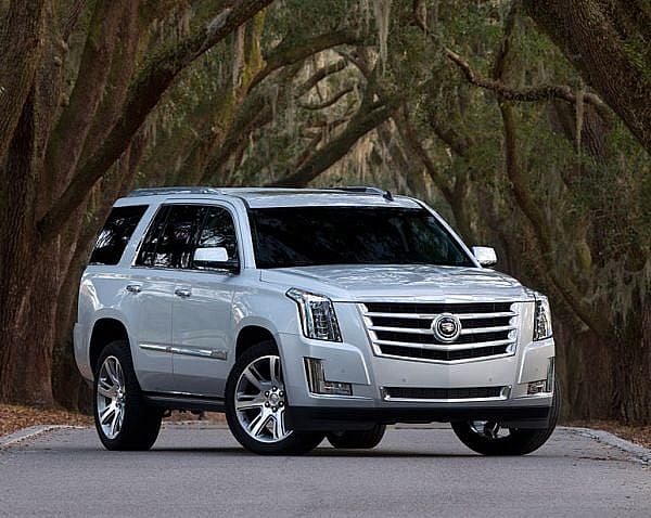 2015 Cadillac Escalade 2015 Cadillac Escalade - We love the Escalade as both chrome-plated object d’art Americaine and anachronism. Every other big luxury SUV has made a major concession to fuel economy: the Range Rover is aluminum, the Mercedes G-Class comes with a diesel engine, and even the crusty Lincoln Navigator is powered by a six-cylinder (albeit turbocharged). The Escalade? A fat 6-liter V8, 6-tons, and a cast-iron body-on-frame build. We’re with Luther Vandross on this one: never too much, never too much.