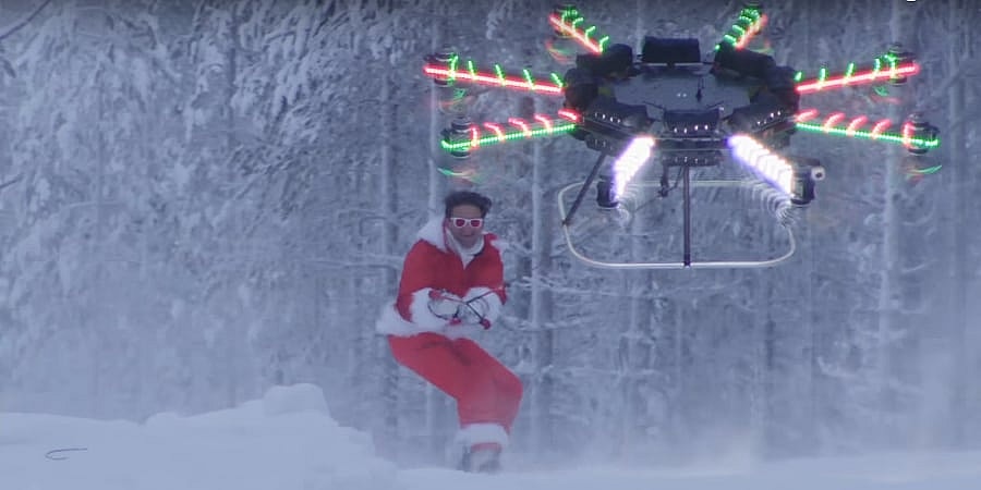 The video starts with the drone towing Neistat on a snowboard