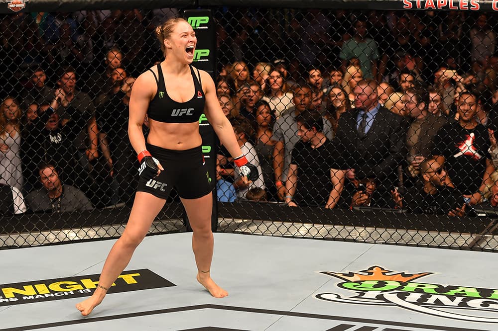 Celebrating after yet another UFC win. Do NOT step to this! Rousey