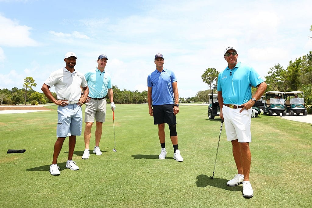 GettyImages-1226632113 Tiger Woods, Peyton Manning, Tom Brady, and Phil Mickelson.