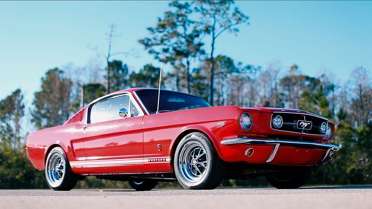 Revology Mustang  Revology Mustang  - The romantic shapes of sixties American cars are unparalleled; the build quality of sixties American cars is uninspiring. That’s why Revology takes a Ford-licensed 1965 body and underpins it with a modern chassis and a big, ol’ 5.0 making numbers a real 1965 could only dream of.