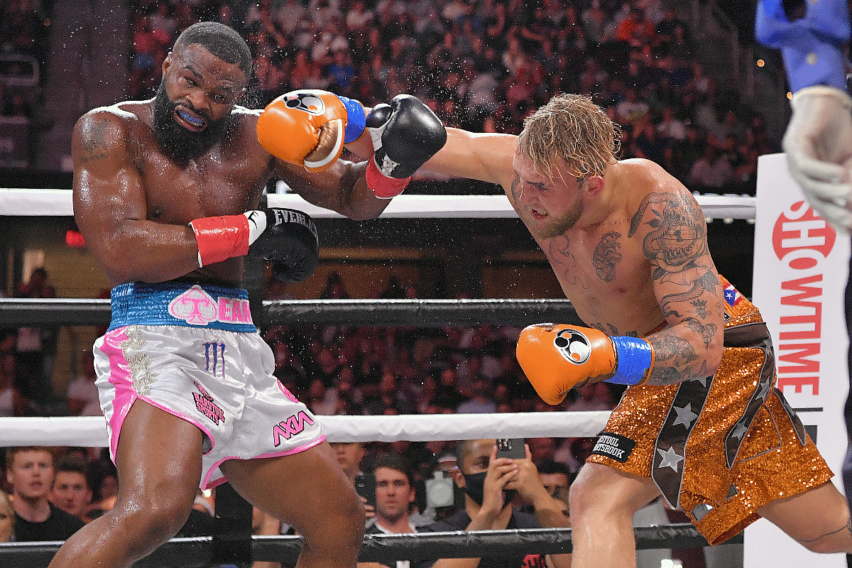 jake-paul-tyron-woodley-main-GettyImages-1337175637 Jake Paul fights Tyron Woodley in during Showtime pay-per-view event at Rocket Mortgage Fieldhouse on August 29, 2021.