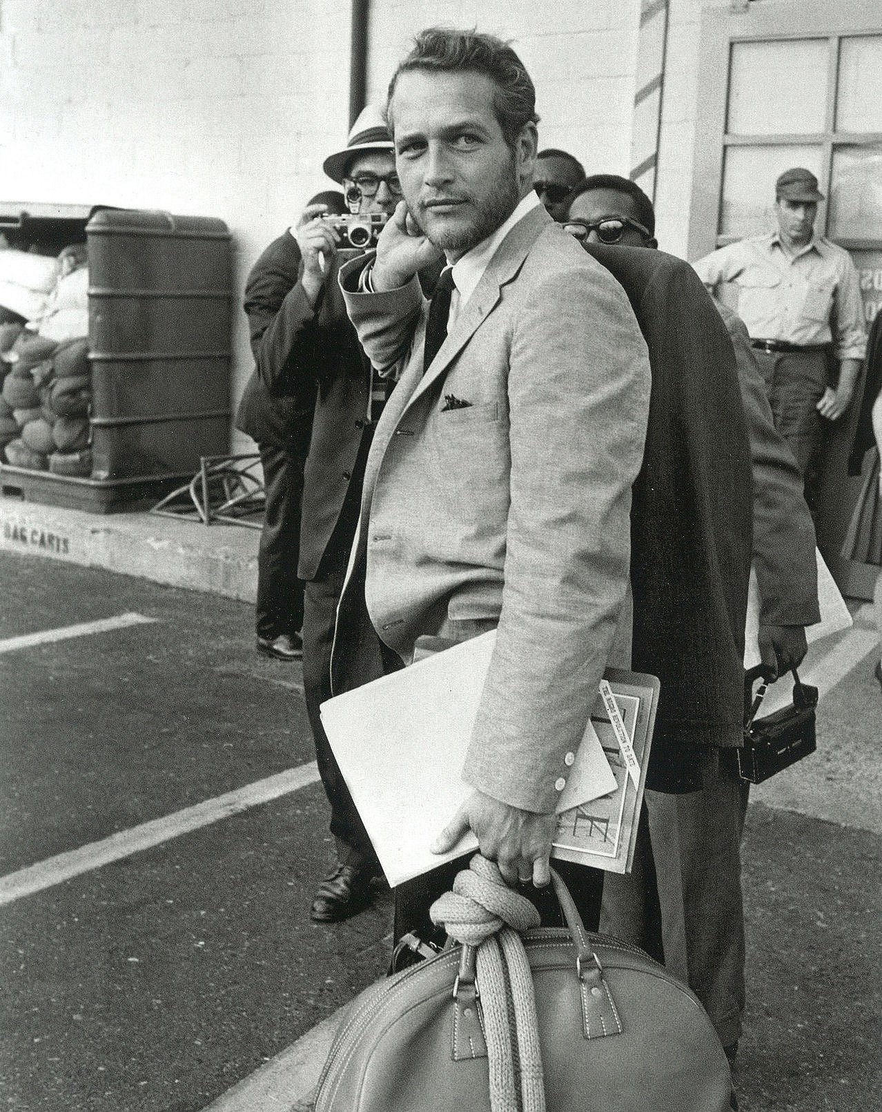 PAUL NEWMAN WITH A DUFFEL