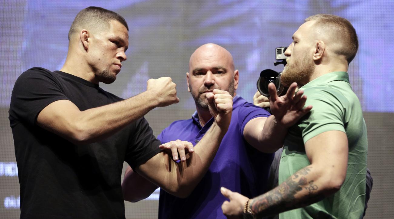 conor-mcgregor-nate-diaz-ufc-press-conference-fight-bottles-video.jpg