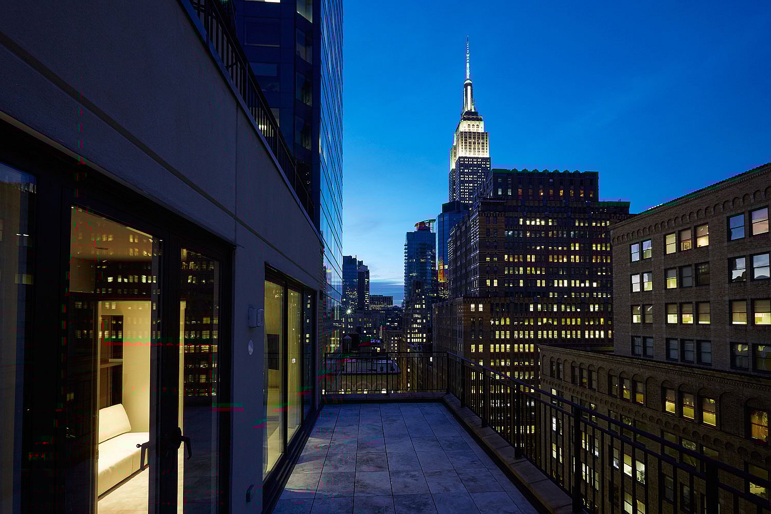 three-bedroom-duplex-penthouse-balcony-empire-state-building-view-night-shot-marmara-park-avenue