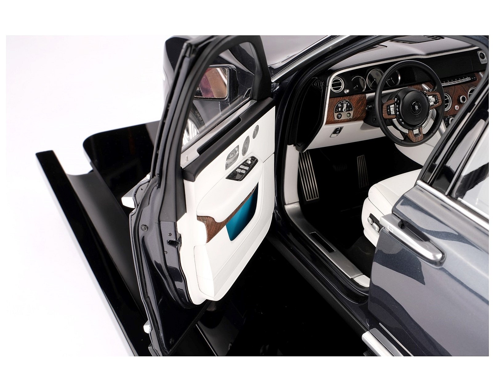 Drivers-Side-Door-Open-with-background Detail of interior of Cullinan scale model.