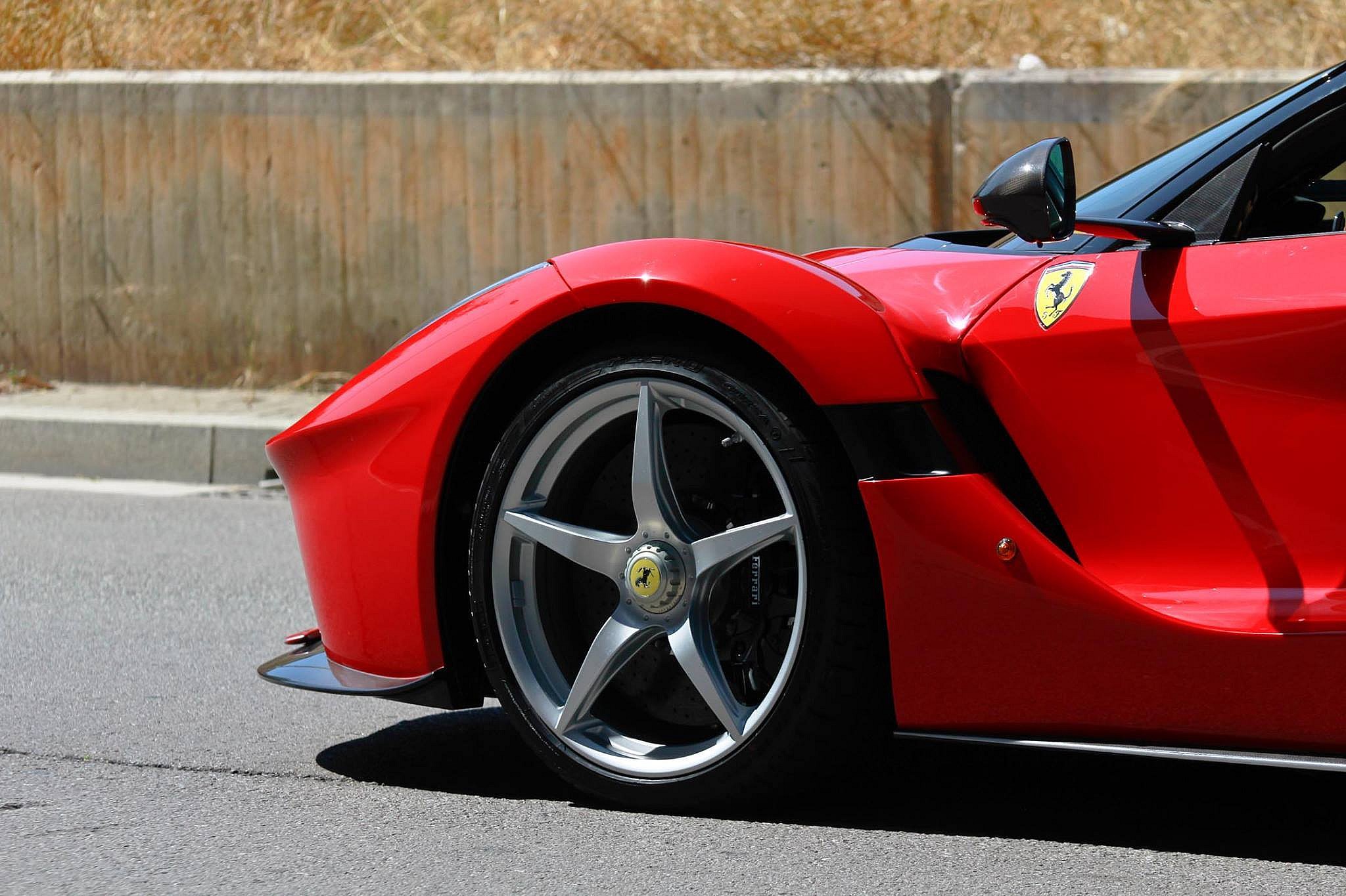 Red Ferrari LaFerrari Aperta front wheel.jpg