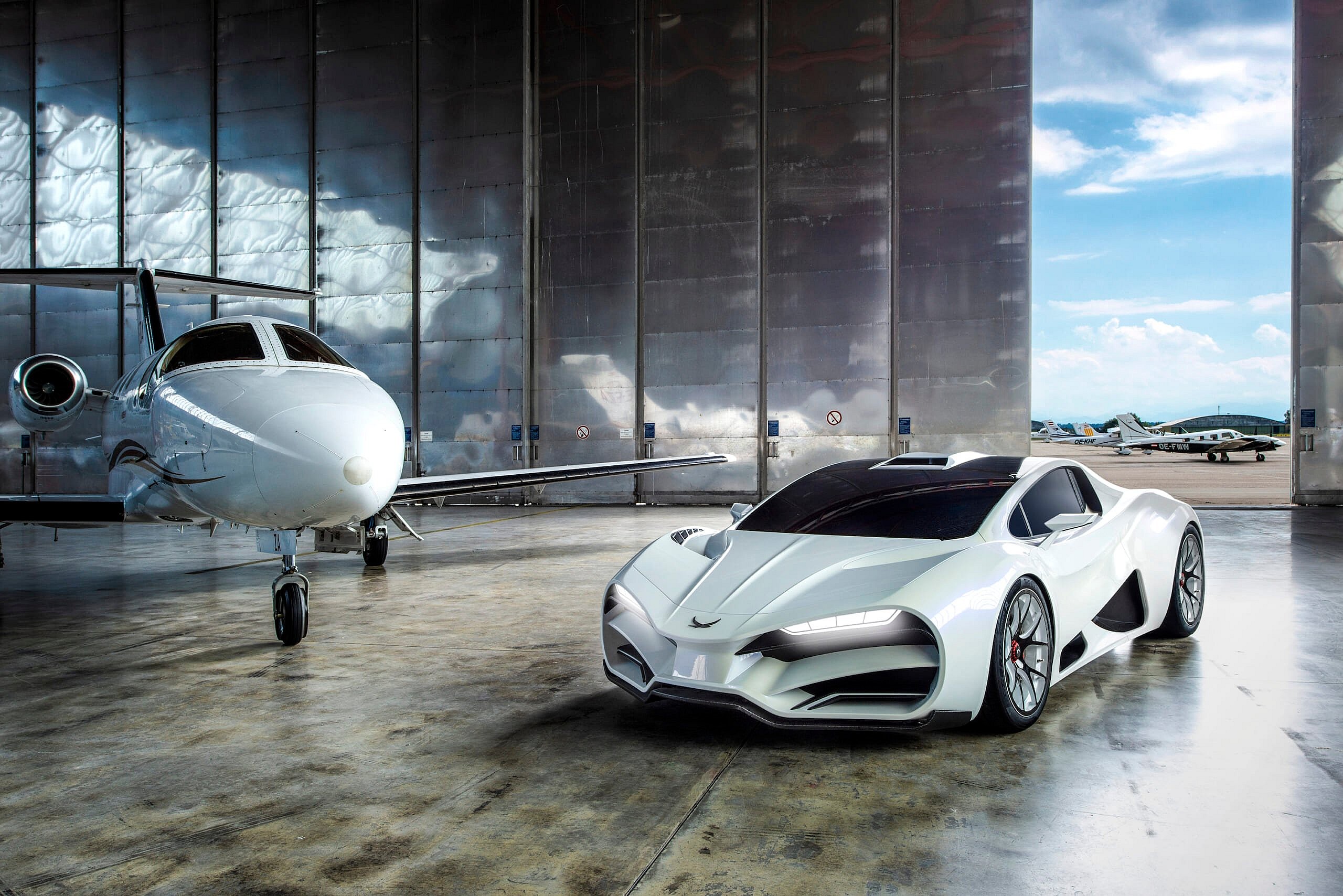 MILAN Red in Hangar- Copyright by Milan Automotive Gmbh