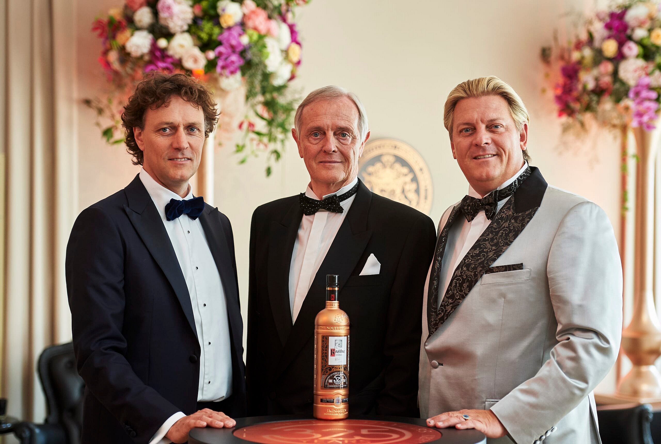 Bob Nolet, Carolus Nolet Sr. and Carl Jr. Nolet pose with the Ketel One Vodka commemorative bottle celebrating 325 years of the Nolet Family Distillery.jpg