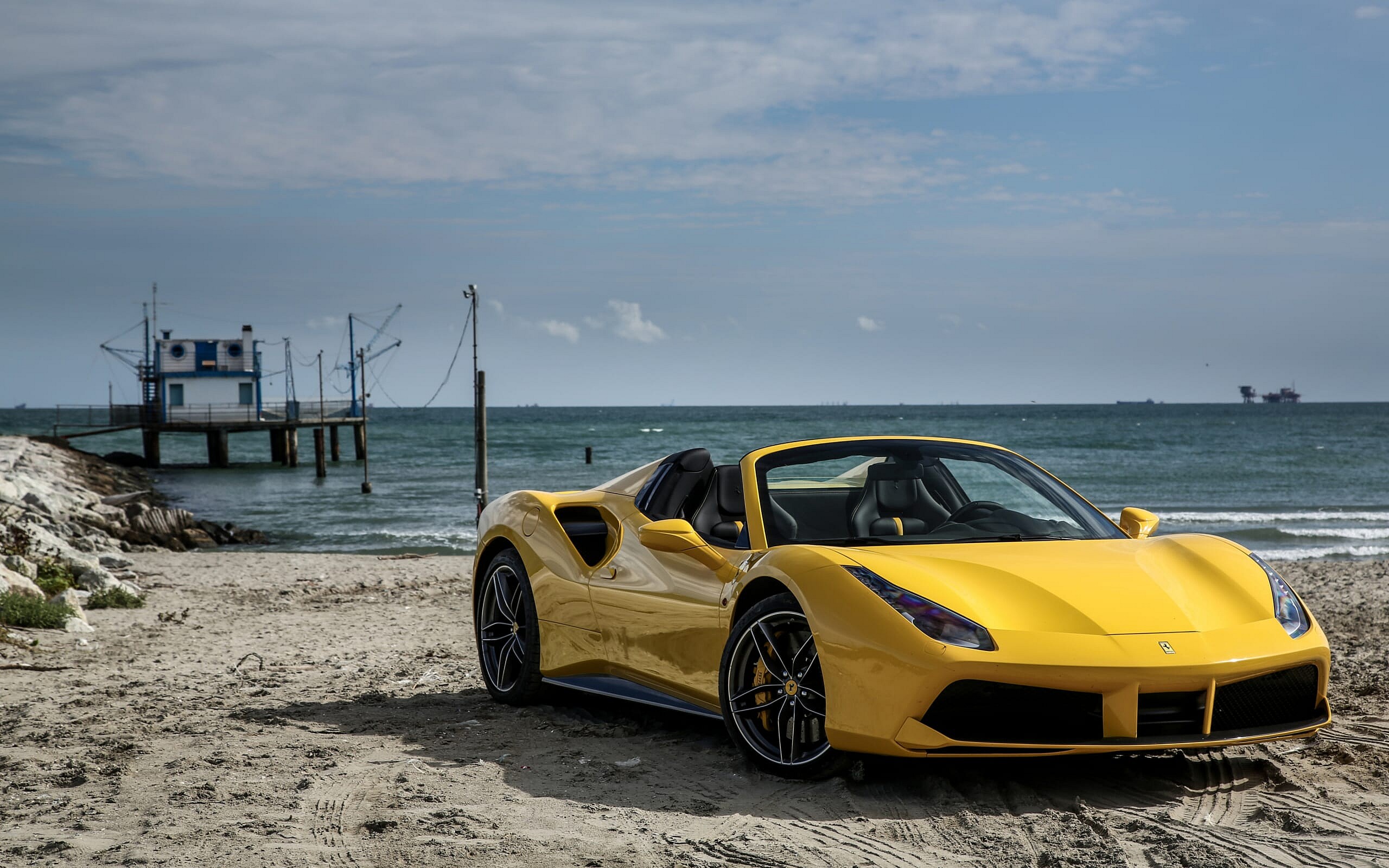 ferrari_488_spider_yellow_side_view_109183_3840x2400.jpg