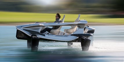 This electric two-seater zips along at 25 MPH