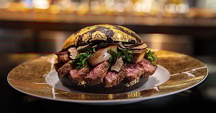 H Bar Black and Gold burger