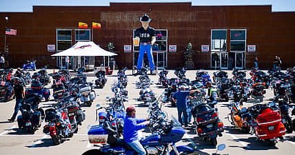 A motorcycle rider outside the Full Throttle Saloon during the 80th Annual Sturgis Motorcycle Rally in Sturgis