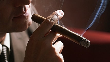 man-with-cigar-GettyImages-97563583 (1)
