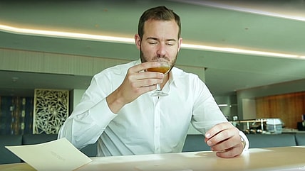 Brian Kelly (a.k.a. The Points Guy) enjoys a pre-flight beverage