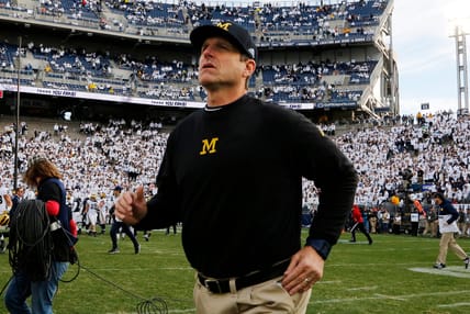 harbaugh-running.jpg