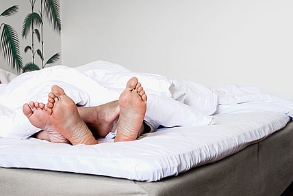 Couple in bed generic Getty