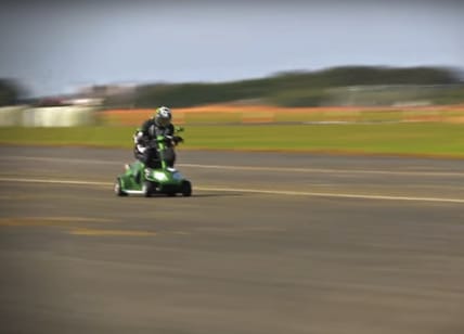 Mathew Hine rides the record-setting scooter to glory