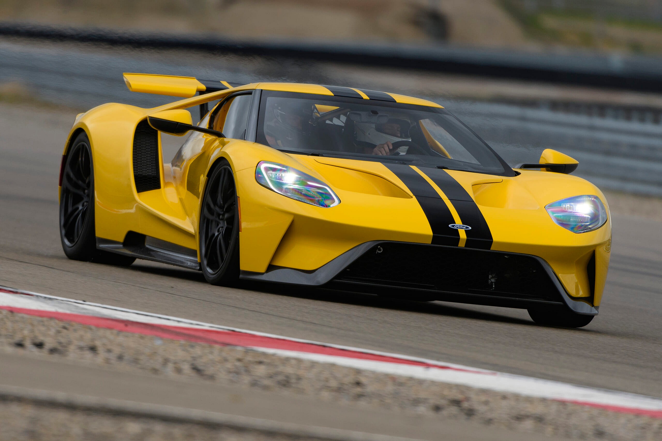 Yellow and black Ford GT on track 2