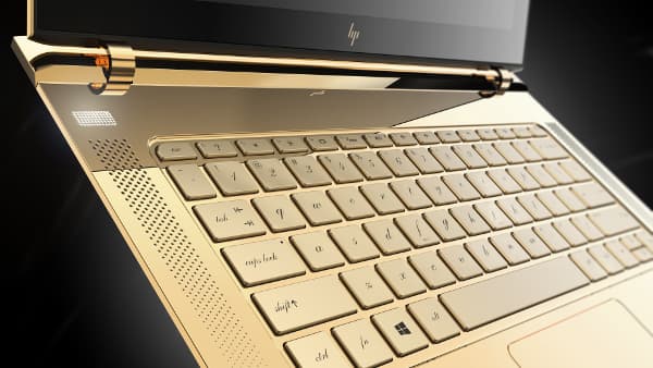 HP Spectre by J Hannah gold laptop - keyboard.jpg Decked out in gold, with a diamond-studded logo
