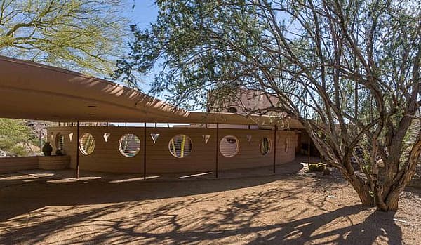 Frank Lloyd Wright last house designed - overpass.jpg Covered parking for two amongst its curvy exterior