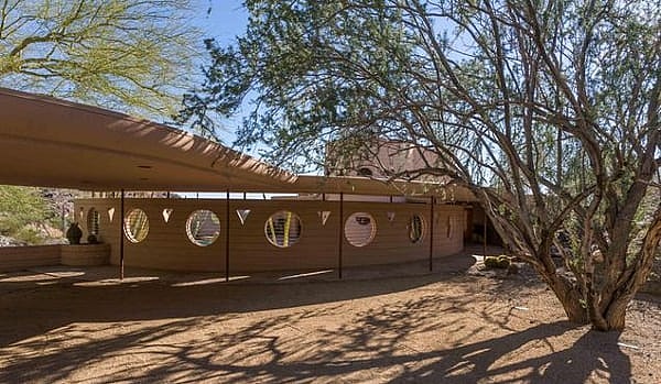Frank Lloyd Wright last house designed - overpass.jpg Covered parking for two amongst its curvy exterior