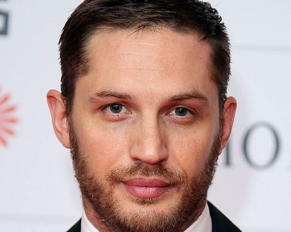 Tom Hardy  Tom Hardy  - You wouldn’t know it from this full, slicked-back look but this bulky actor has fine hair. What does Hardy know? Finer hair should be towel-dried thoroughly before slicking back to avoid any separation that could make the hair look thinner than it is. Additionally, low-shine product visually thickens hair.