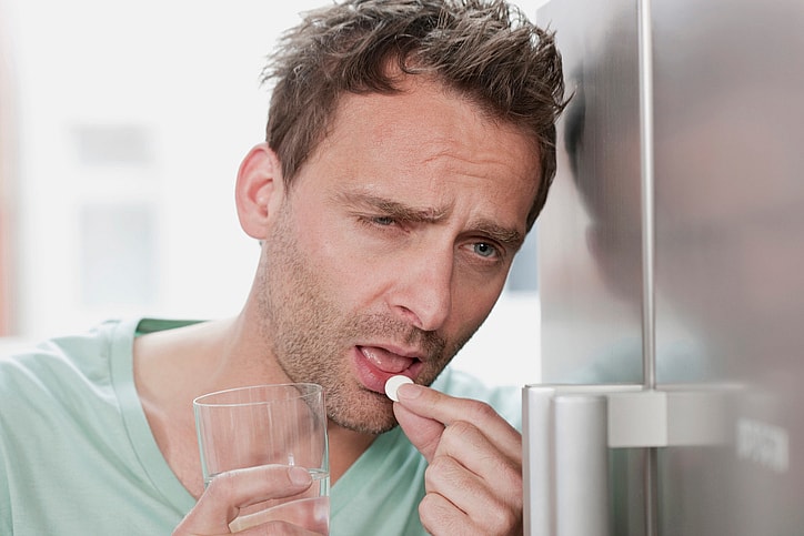GettyImages-106353279.jpg Guy with hangover