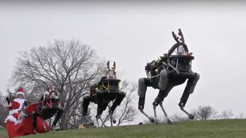 Boston Dynamics Spot robots pulling Santa's sleigh