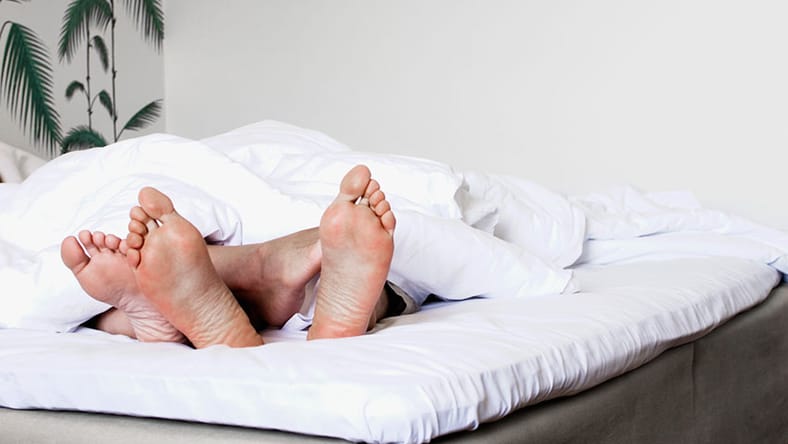 Couple in bed generic Getty