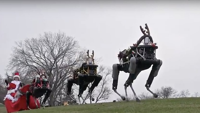 Boston Dynamics Spot robots pulling Santa's sleigh