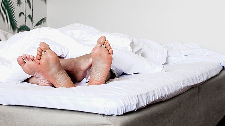 Couple in bed generic Getty