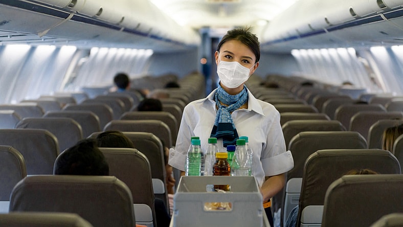 flight-attendant-plane-pandemic-GettyImages-1257821431