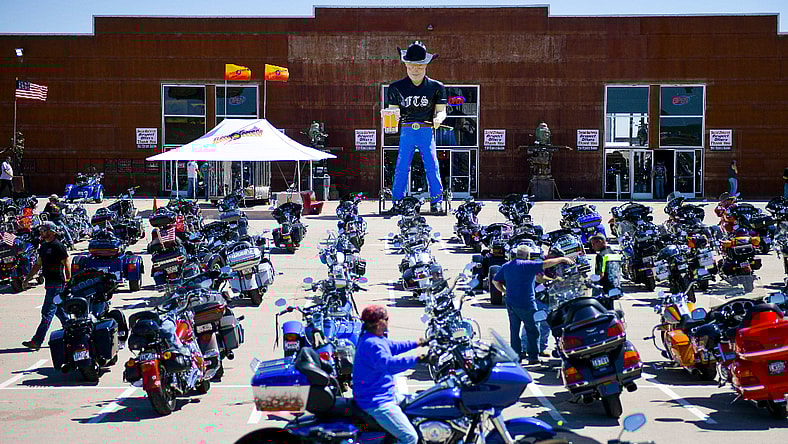 A motorcycle rider outside the Full Throttle Saloon during the 80th Annual Sturgis Motorcycle Rally in Sturgis