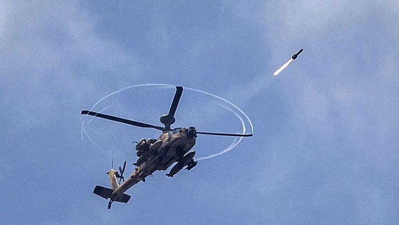 Apache helicopter in action. (Photo: Jack Guez/Getty Images)