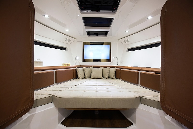 Evo 43 Xtensions Yacht - stateroom.jpg Even the stateroom transforms with a rising table (Photo: Evo Yachts)