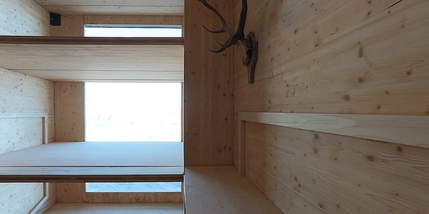 Not the most lavish interior, but hey, it's a shelter (Photo: OFIS Arhitekti)