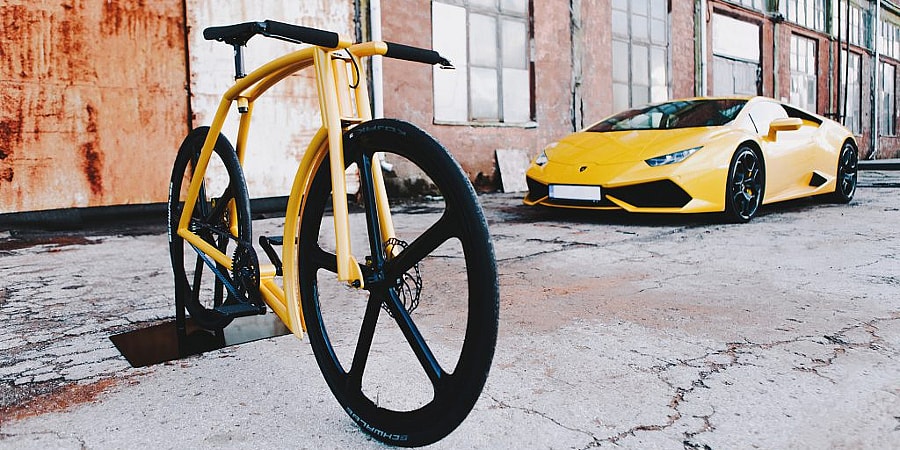 Viks GT Lamborghini inspired bicycle - with car.jpg It'll be available in different frame sizes and