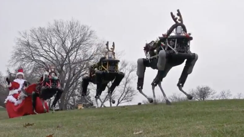 Boston Dynamics Spot robots pulling Santa's sleigh