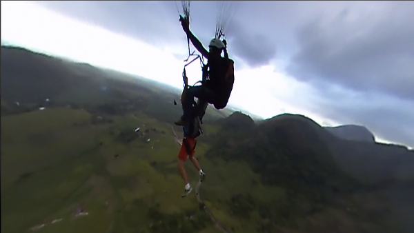 Caio Afeto BASE jumps from a paraglide