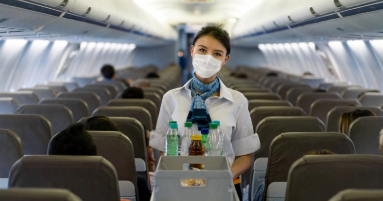 flight-attendant-plane-pandemic-GettyImages-1257821431