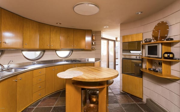 The kitchen's curvy countertops and plentiful storage