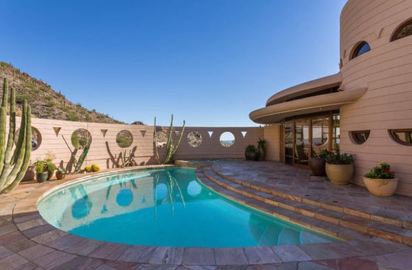 A crescent-shaped pool was added to the original garden area