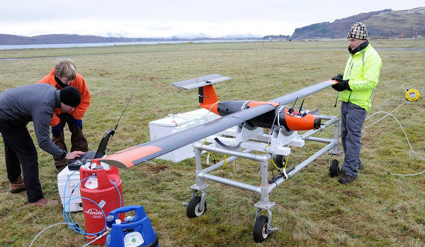 Hydrogen-powered fixed-wing drone - 1.jpg The SAMS team preps the drone for flight