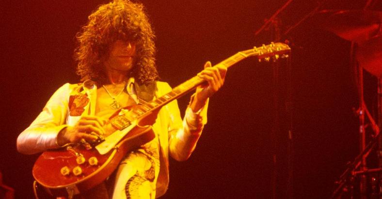 Jimmy Page performs with Led Zeppelin at Madison Square Garden in 1977.