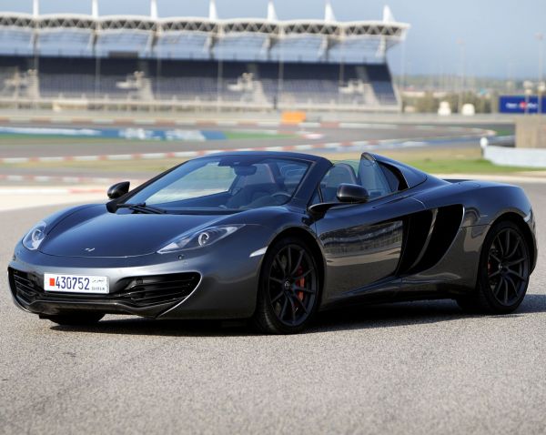 McLaren 12C Spider - Twin-turbocharged 3.8-liter V8 with 615 horsepower and 445 lb-ft of torque. 