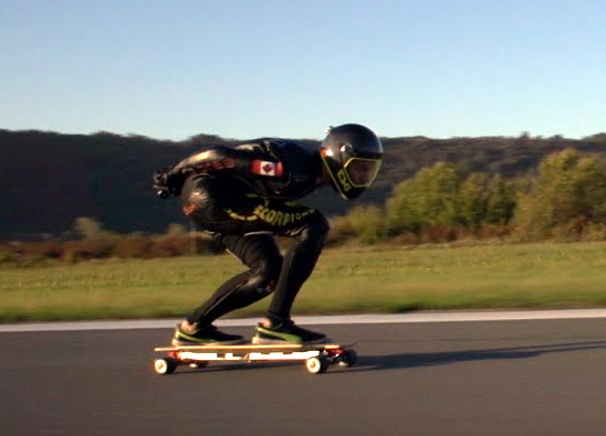 Mischo Erban zooms along at 60 MPH on an electric skateboard