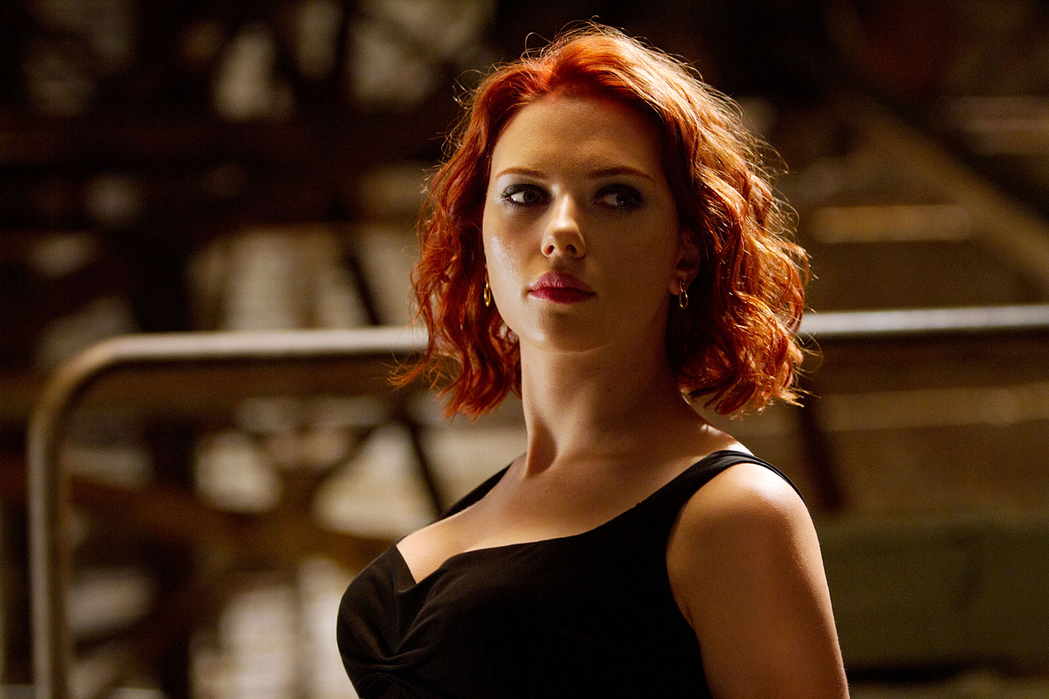 Natasha Romanoff a.k.a. Black Widow (Played by Scarlett Johansson) - A grade-A assassin who was initially brainwashed by the KGB, she’s fighting with the Avengers now. Nat is an indispensable member of the team who can ride a motorcycle and ruthlessly kick ass with the best of them.