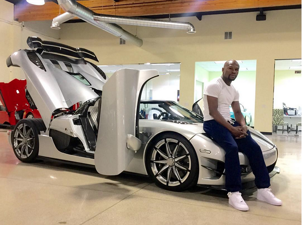 Floyd Mayweather with his Koenigsegg CCXR