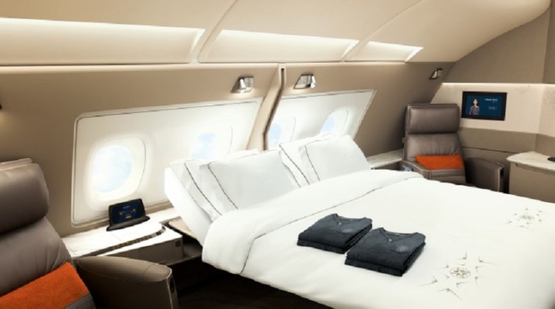 Queen bed. ON A PLANE